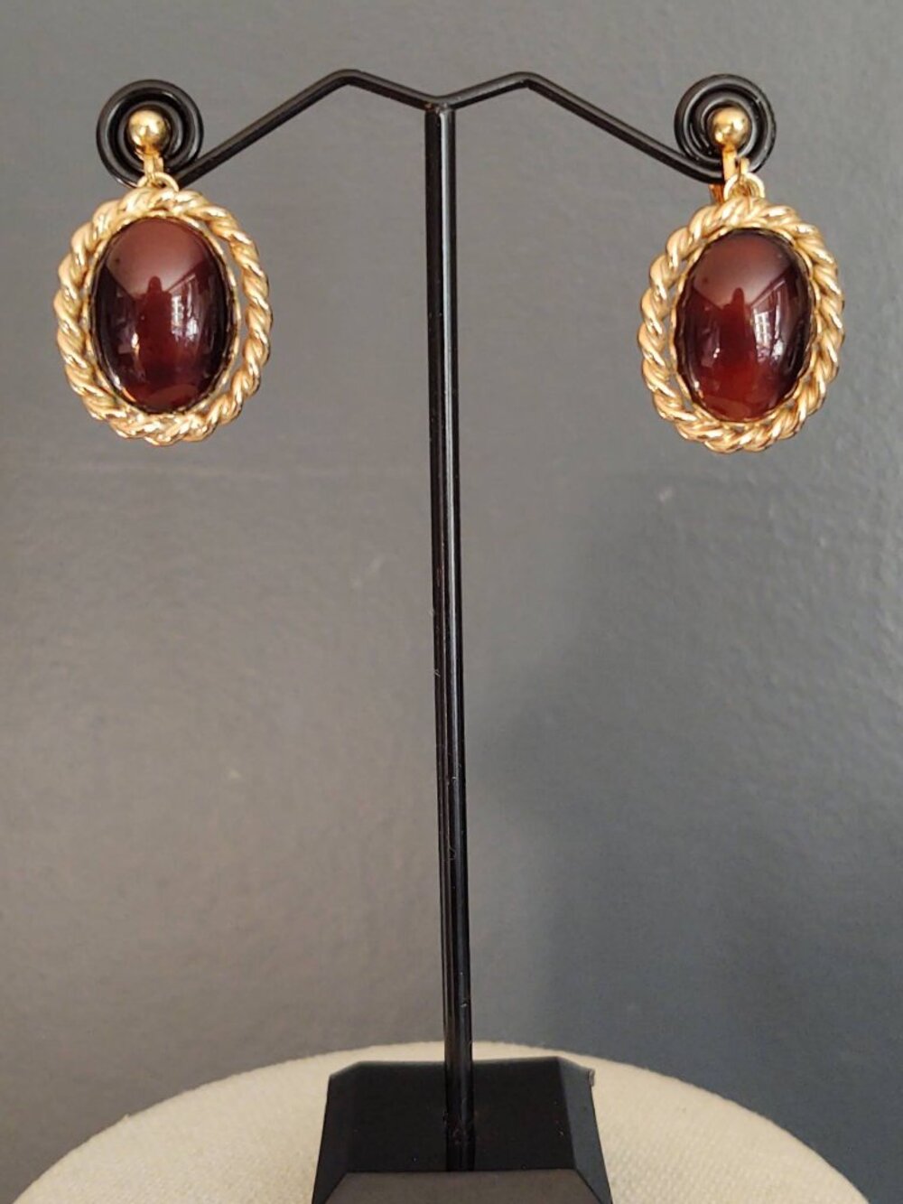 Brown clip-on earrings with gold frame